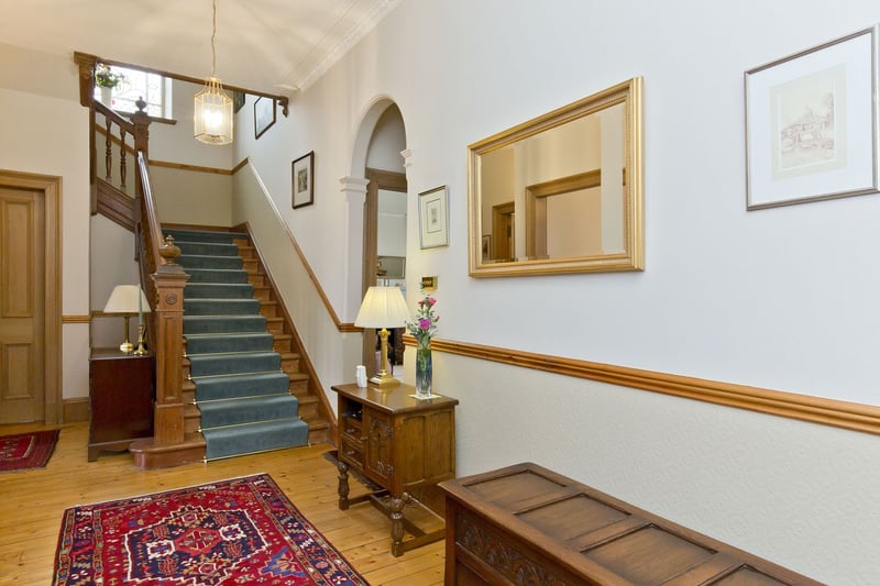 A bright vestibule and reception hall provides a hint of the impressive accommodation to follow. They offer built-in storage and a lovely introduction, complete with attractive period features such as four-panel wooden doors and a traditional staircase with an ornate wooden banister. 