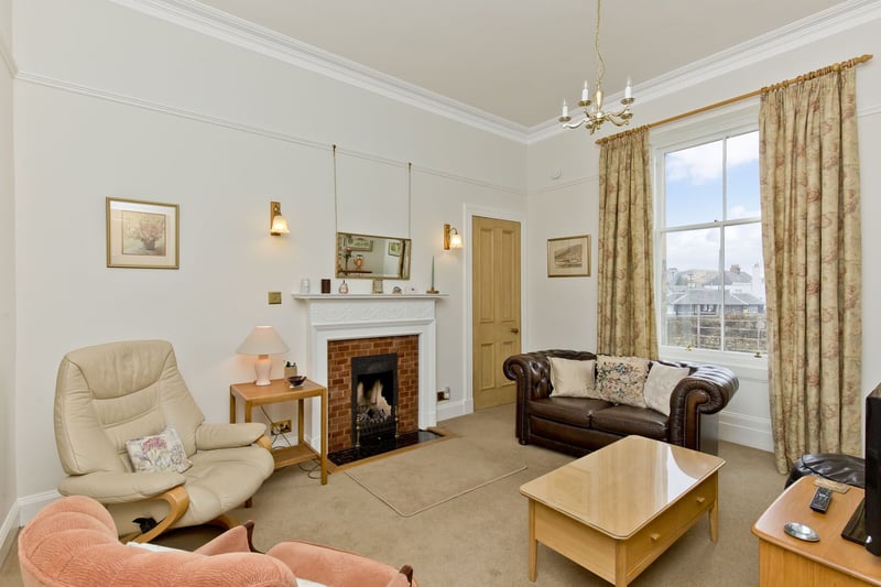 With three ground-floor reception rooms, there is plenty of space for families. The family room/home office provides great space and period details including a lovely fireplace, cornicing and high ceilings.