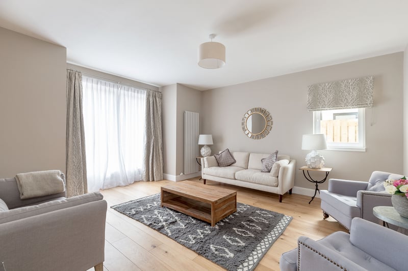 The bright and spacious sitting room is the perfect space to relax after a hard day.