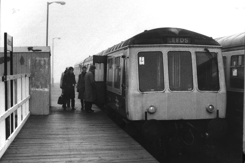 Early morning commuters board a train to Leeds at Altofts Station which in May 1985 was threatened with closure.