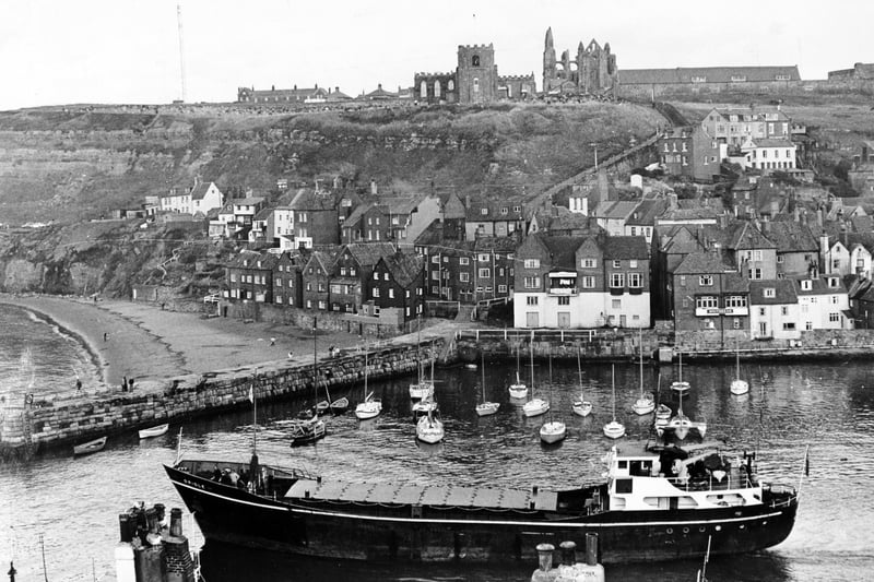 The 430 tons London ship Oriole leaves Whitby Harbour in September 1985  after discharging her cargo.