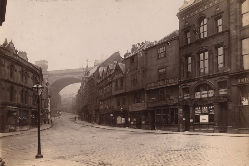 A view of the Side Newcastle upon Tyne taken in 1899. The photograph has been taken from Akenside Hill looking up the Side towards the junction with Dean Street. The buildings on the right-hand side include the business premises of: G.E.T. Smithson