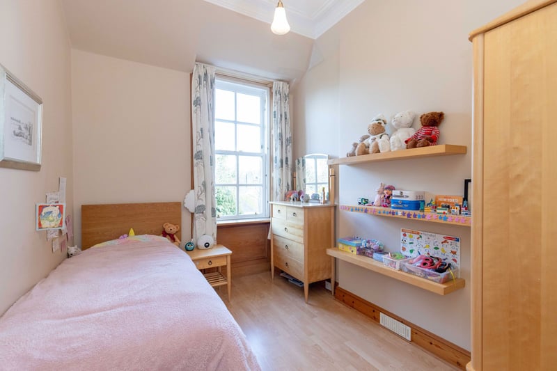 A further double bedroom with a window to the rear overlooking the garden.
