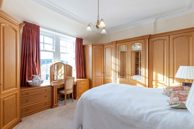 The second large double bedroom with window to front again offering open views to Arthur's Seat. There are also extensive built in wardrobes with matching dresser. 