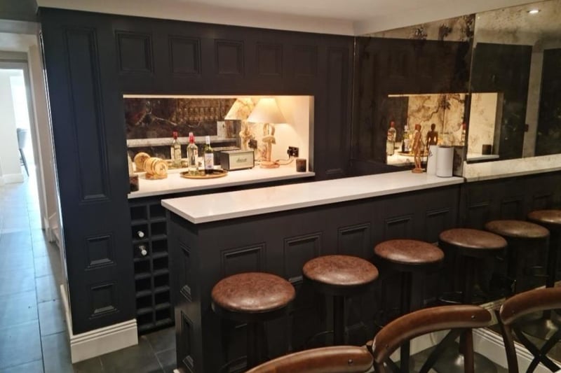 The bar area within the home is well presented and modern.