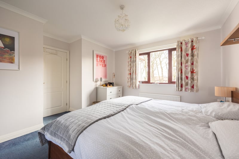 The generously proportioned principal bedroom comes with a fabulous walk-in wardrobe and an en-suite shower room.