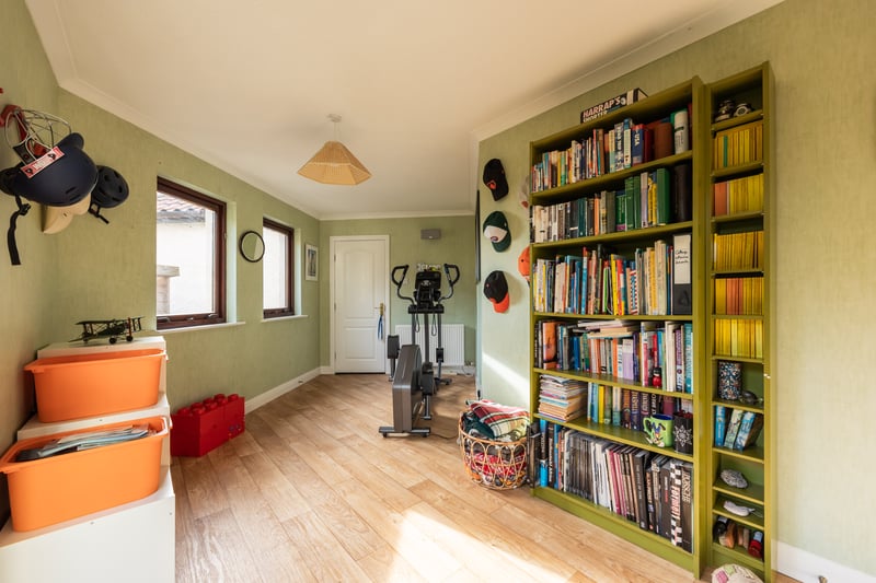 The good-sized second family room, with direct access to the rear garden.