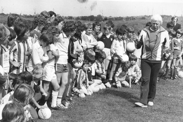 Coach George Wardle with a group of youngsters who attended the 1978 weekend football teach-in at the Temple Park Leisure Centre