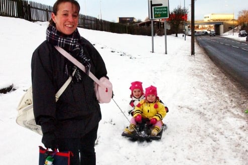 These little ones - Kimberley and Rebecca Watt - were treated to a sledge ride to school in the snow by their mum Lynn in Easington Village in 2004.