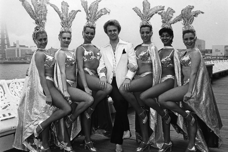 Impressionist Bobby Davro with the Marina Zelos dancers on Central Pier, 1983