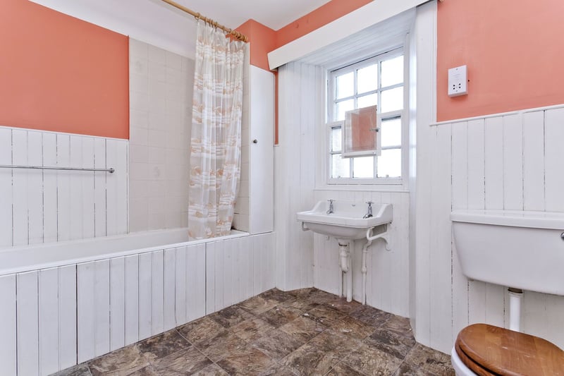 The family bathroom, which is fitted with a three-piece suite.
