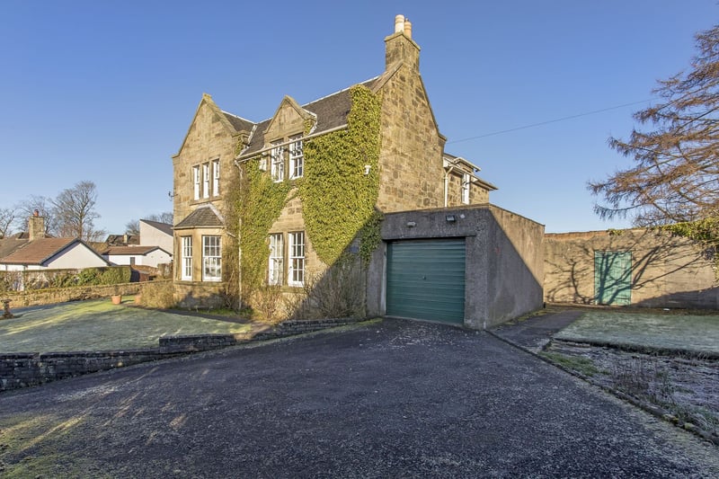 Externally, the property enjoys a fully enclosed garden. The front garden is mostly laid to lawn, with borders of mature shrubbery. The property also benefits from a garage and driveway. The back garden which is mainly laid in lawn and partially slabbed giving access to two out houses.