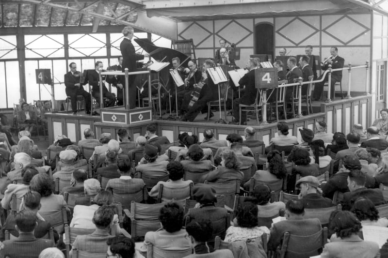 The refined sounds of an orchestra provide the entertainment for this audience in the North Pier sun lounge