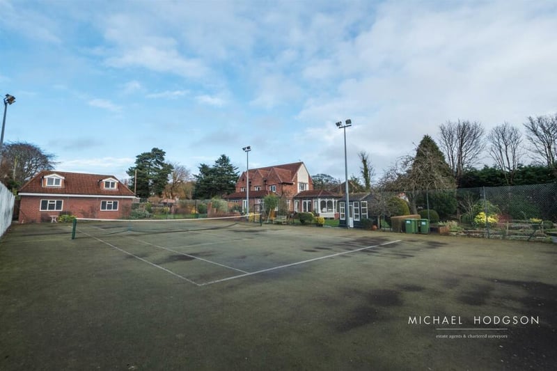 One of the most unique aspects of the property is the full sized tennis court.