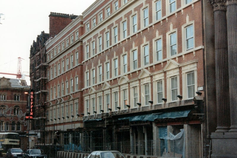 The Griffin Hotel on Boar Lane with buildings to the right also visible. Alterations are being carried out to ground floor level. The hotel was closed in July 1999.