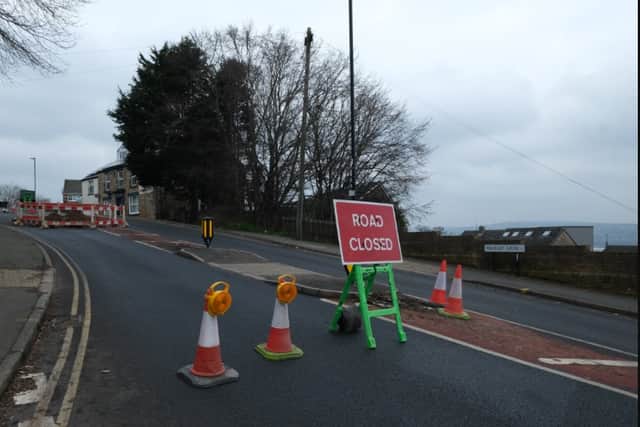 The road is closed in one direction, heading towards Crookes, as a result of the sink hole, while repair work is carried out