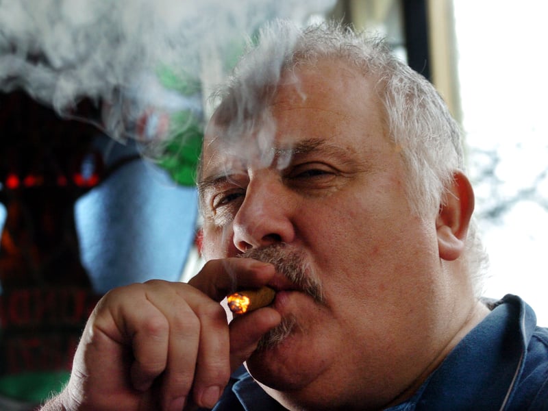 Original Oak licensee Martyn Goulding enjoys a smoke in his pub in February 2007.