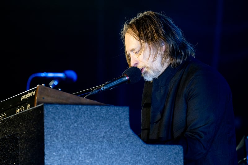 Thom Yorke performs at Manchester's Victoria Warehouse with fellow The Smile members Johnny Greenwood and Tom Skinner, accompanied for the first time by the London Contemporary Orchestra. Credit: BBC Radio 6 Music