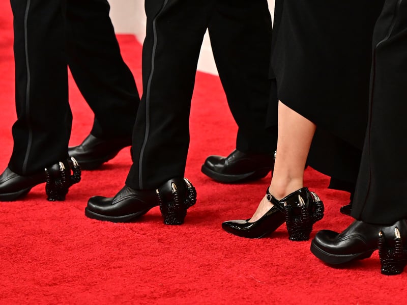 The crew of Godzilla Minus One may have only been up for one Oscar — Best Visual Effects — but that flair for design translated to the red carpet with their custom footwear which pays homage to the monster. 