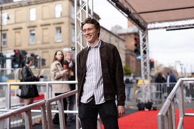 Actor George MacKay on the red carpet on Rose Street for the Scottish premiere of The Beast. 