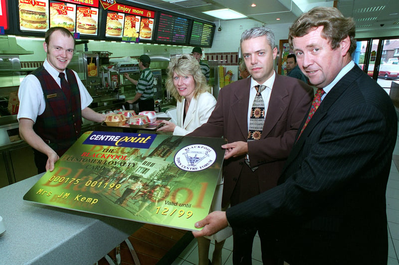 Simon Ashworth serves the burgers and accepts the Blackpool Loyalty Card from former Gazette Executive Editor Alison Bott, Hesketh Group MD Neale Graham and Town Centre Manager Nigel Hanson.