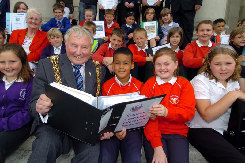Lord Mayor of Leeds Coun Brian Cleasby pictured outside the Civic Hall in June 2007 with the Morley family of schools to recognise the work of tackling racism and inequality. 