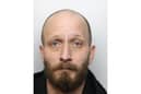 South Yorkshire Police are searching for Phillip Taylor, 38, from Canklow, Rotherham, who is wanted in connection with reports of assault, criminal damage, arson and threats of theft in March 2024.