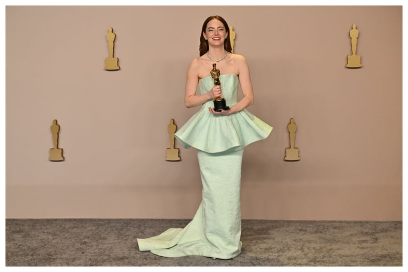 Emma Stone was most certainly a winner at the Oscars as she won for Best Actress but I thought her pale green strapless Louis Vuitton dress was not a hit!