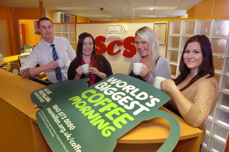 Taking part in the Macmillan Worlds Biggest Coffee Morning in 20111 were staff at the SCS offices in Villiers Street.
Here are Craig Davies, Gabrielle Bruce, Katie Rossi and Lauren Barker.
