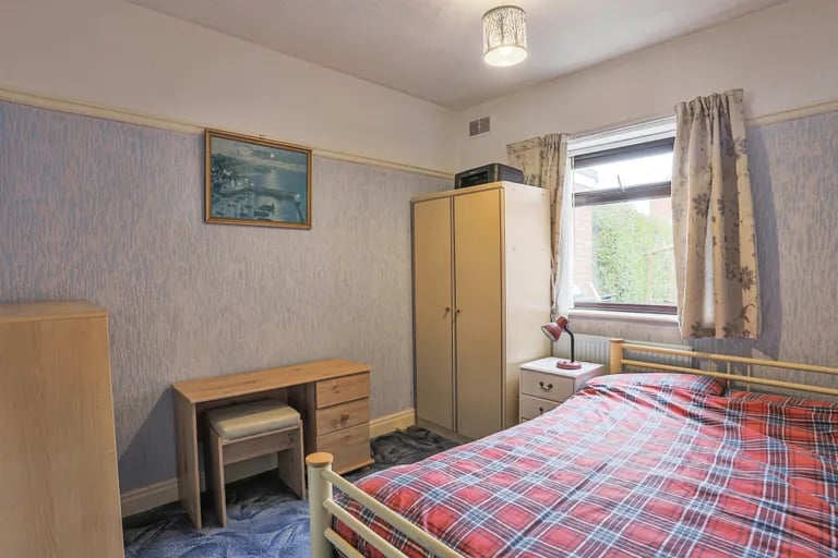 The second bedroom is another double with window to the rear.
