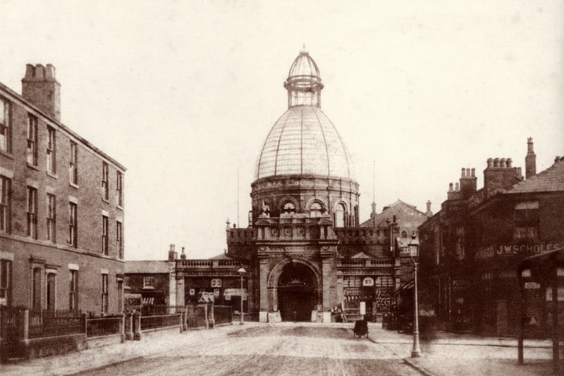 The 120ft x 42ft glass dome of the Winter Gardens Church Street entrance was completed on 18th March 1878 and the Floral Hall was open at Easter that year. Looking down Abingdon Street, the railings of St Johns Church can be seen on the left and the corner of Birley Street is on the right 
