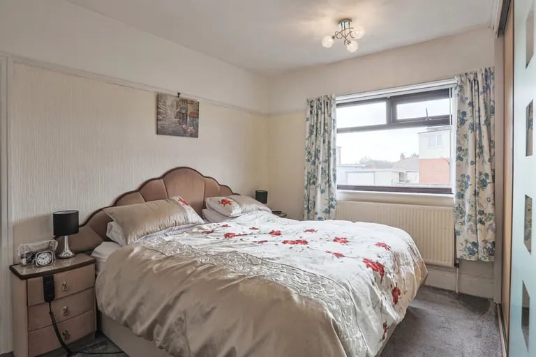 The master bedroom is a spacious double.