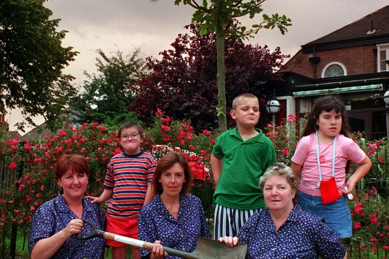 Staff at Marks & Spencer in  , Moortown planted a tree in the car park with the help of children from Grafton School,
Pictured, from left, are Julie Cull, Joe Roberts, Lynn Robson, Darren Reid,  June Wheelhouse and Soozie Bentley. Pictured in July 1999.