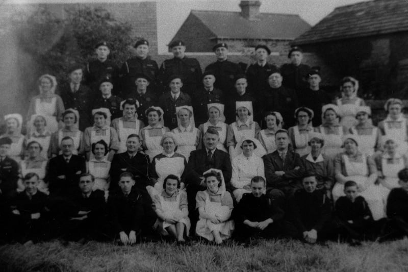 A photo of members of the Civil Defence Groups in Garforth during the Second World War. These include Air Raid Wardens, Auxilliary Fire Services and nurses. 