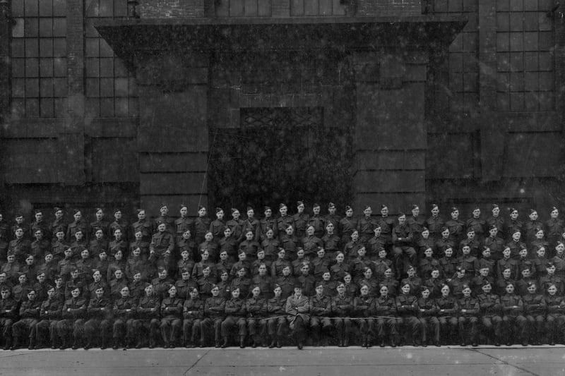 A Home Guard platoon in front of Whitehall Road power station, with Ernest Seal, later a YEB executive, in the fourth row back, eleventh from left. 