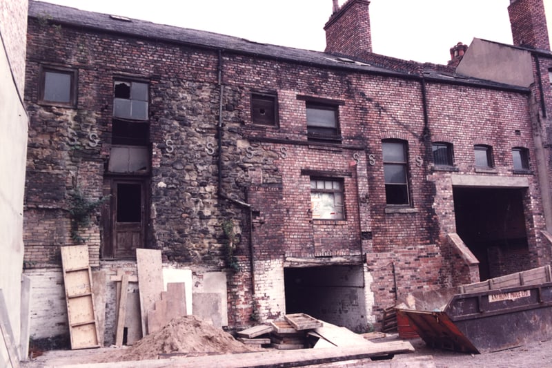 A view of the rear of buildings on Broad Chare taken in 1984. The buildings are derelict and are in the process of being renovated.