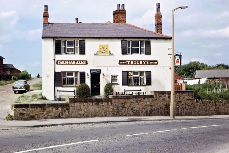 When the Cardigan family came to reside at Howley Hall the inn took the name in respect to the Lords of the Manor. The Cardigan Arms was located on Dewsbury Road opposite St. Mary's Church, Sunday School and Vicarage. It was demolished in 1972 for road widening. The road where the car is parked leads to Woodkirk Station.