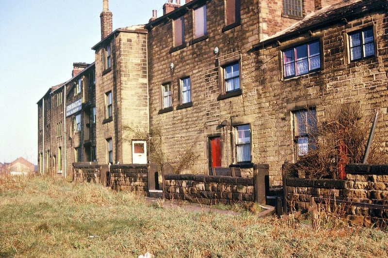 These are houses and old rag warehouses at the High Street end of Hunger Hill. The building shown on the left here as Bragg's rag warehouse was for a long while the Great Northern Hotel. At the time this photo was taken in January 1967 practically all the other buildings on the street had been demolished, most of them before the Second World War.