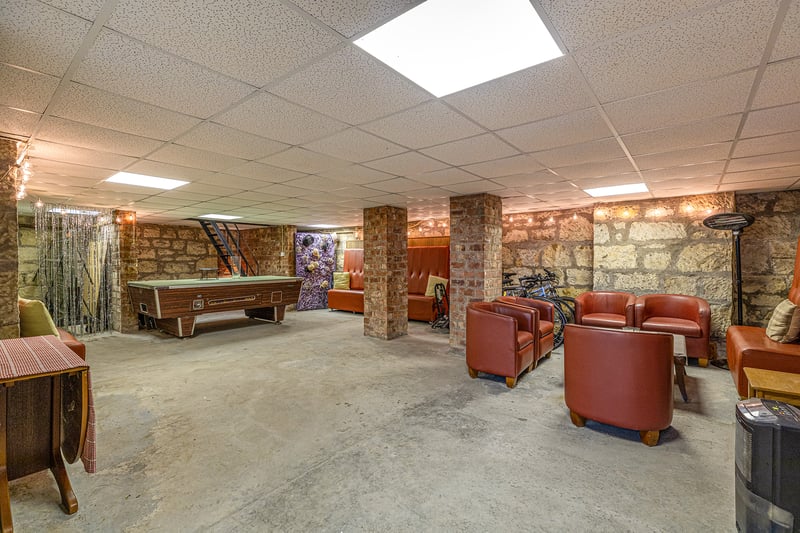 A part of the home that has been much loved by the Wallaces is the vast basement entertainment space, which they have kitted out with a snooker table and seating areas, and which they say has created many happy memories.