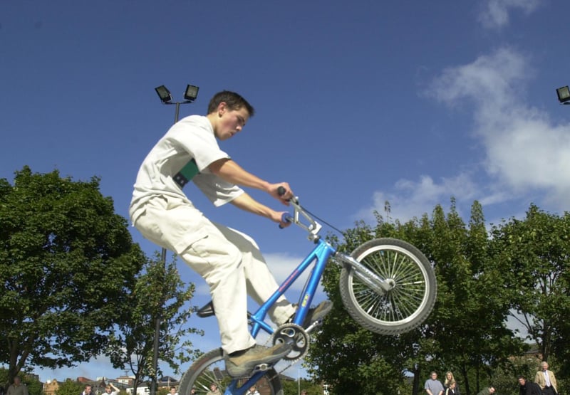 A cyclist performs a wheelie in the newly completed Devonshire Green skateboard park