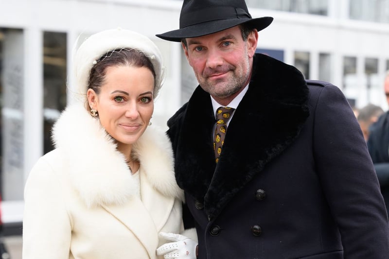 CHELTENHAM, ENGLAND - MARCH 13: Camilla and Mark Stewart attend Style Wednesday, day two of the Cheltenham Festival at Cheltenham Racecourse on March 13, 2024 in Cheltenham, England. (Photo by Leon Neal/Getty Images)