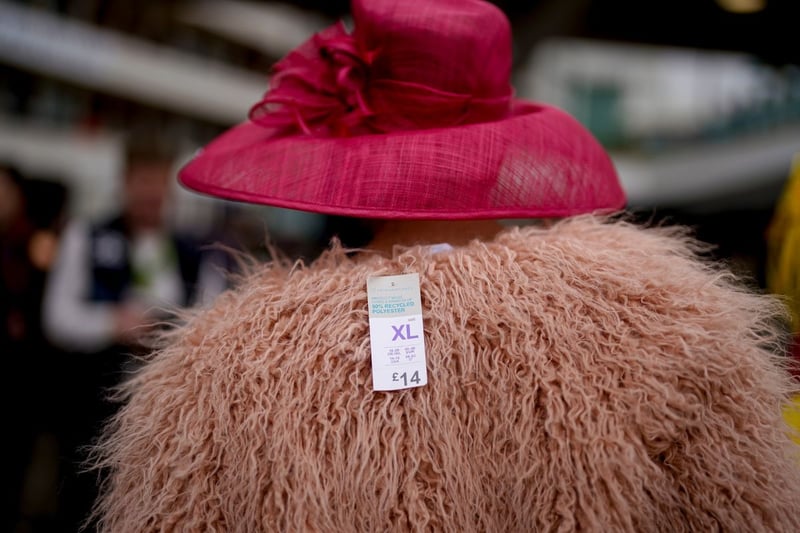 Fashion during day two of the Cheltenham Festival 2024 at Cheltenham Racecourse on March 13, 2024 in Cheltenham, England. (Photo by Alan Crowhurst/Getty Images)