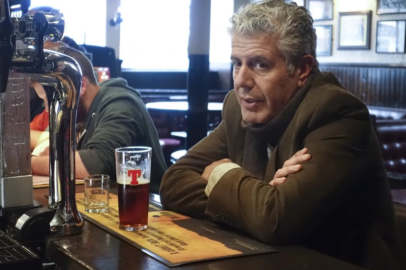 During the filming of his Parts Unknown series, Bourdain  first headed to the Old College Bar on High Street which is now no longer there having been burned down and demolished in 2021. There he sampled some freshly poured Tennent’s lager which is brewed less than half a mile away from the pub.