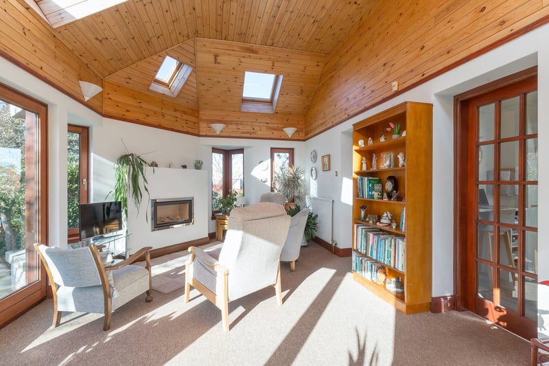 There is a large sun room which also enjoys a pleasant outlook and gives access to the garden.