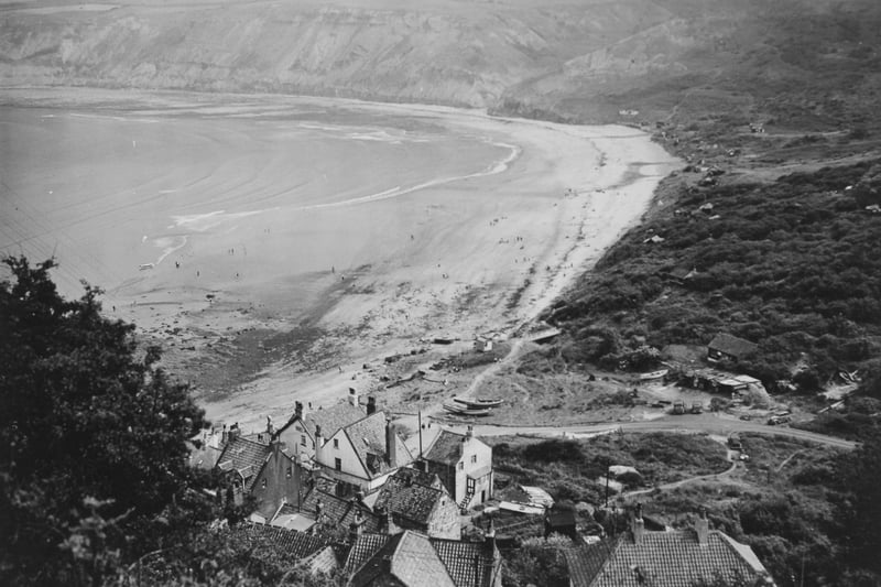 A view from above the village in June 1949. Private chalets can be seen dotted amongst the vegetation at the edge of the beach.