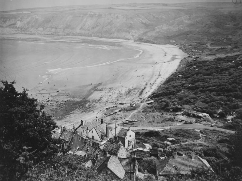 A view from above the village in June 1949. Private chalets can be seen dotted amongst the vegetation at the edge of the beach.