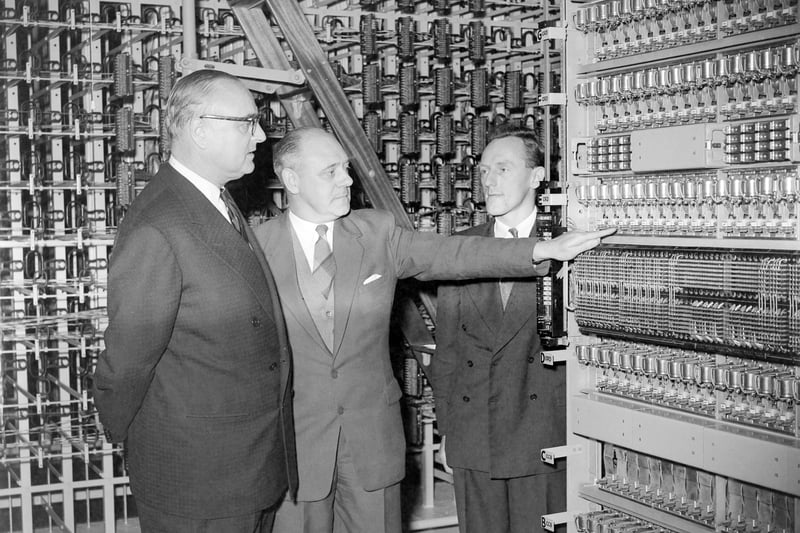 Mr J C E Postance (centre) the executive engineer, explains the working of the new Marton automatic telephone exchange, on Preston Old Road, to Sir Roland Robinson MP for Blackpool South. On the right is MR J D Ball. 1959