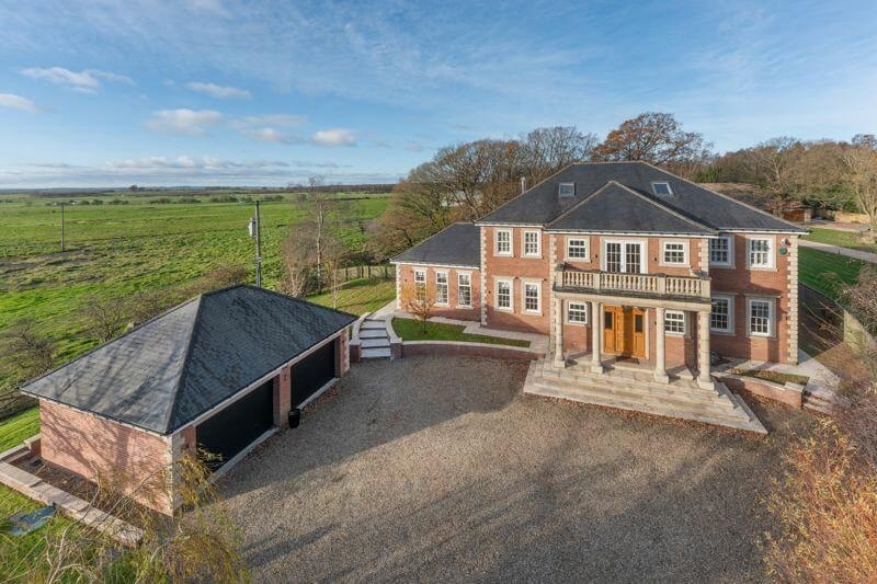 This five-bedroom family home is on the property market for a guide price of £1,750,000.