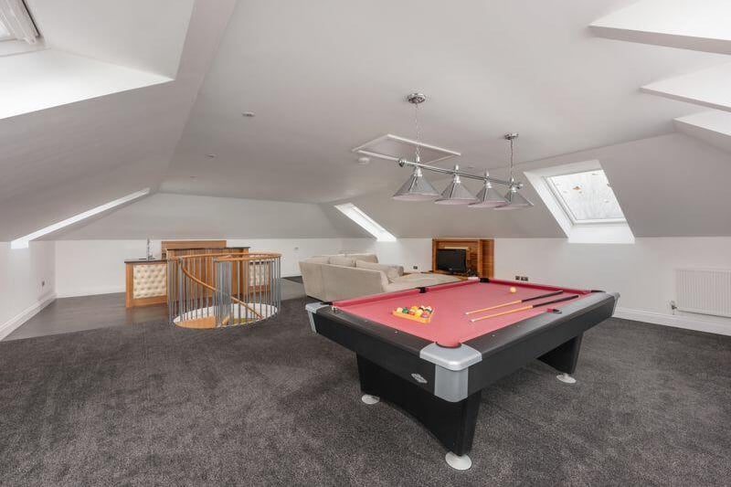 On the top floor of the property, there is a second games room.