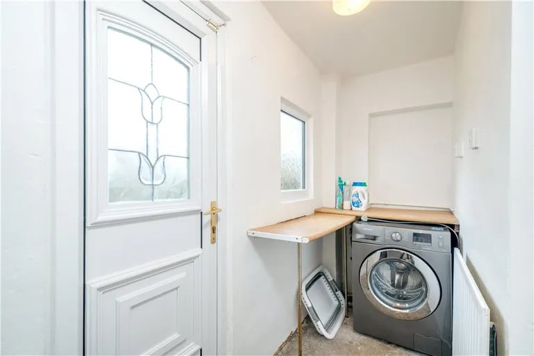 On the ground floor is also a handy utility room.
